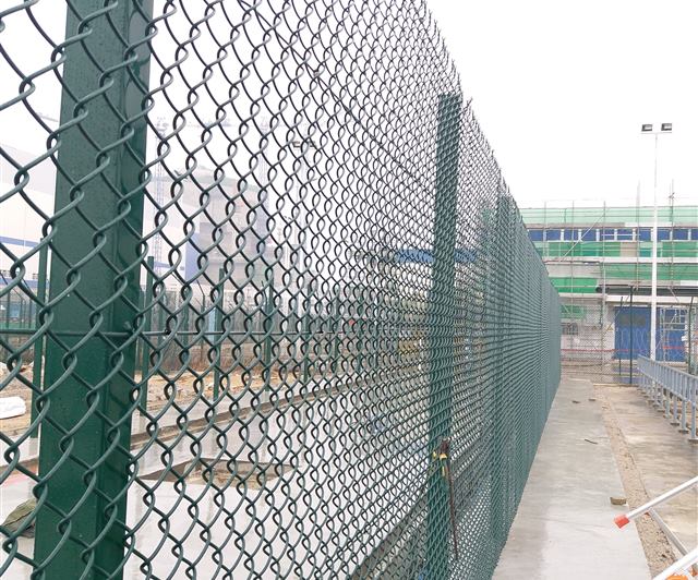Chain link sports fence detail